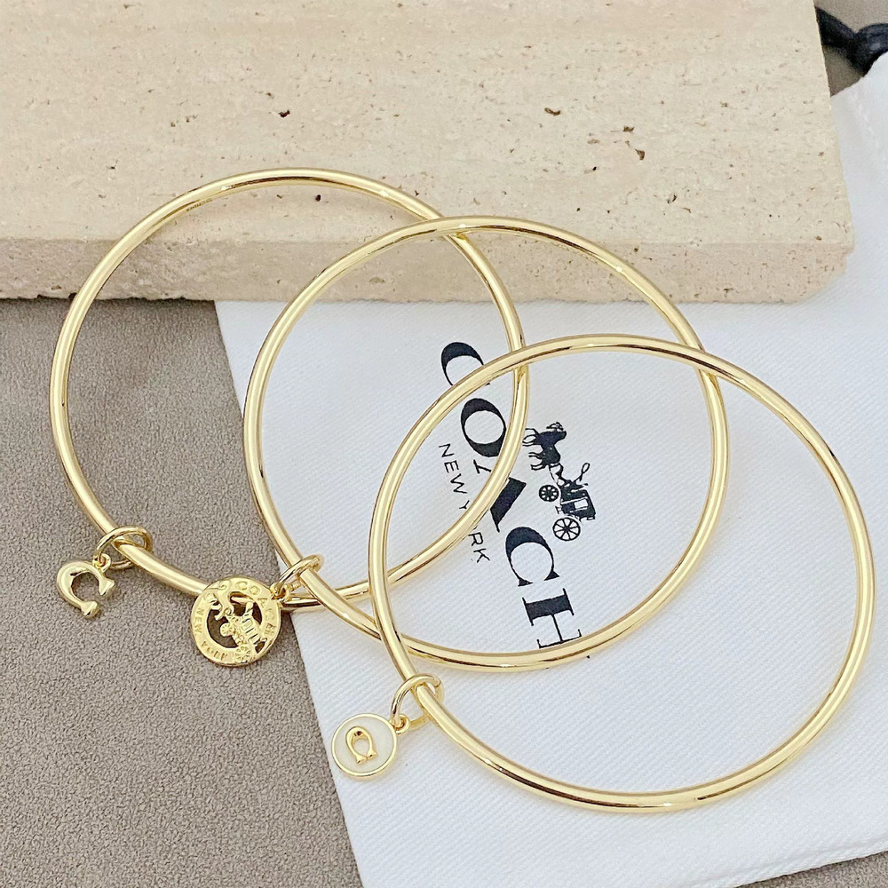 Coach Copper Plated 3-in-1 3 Rings Bracelet Letter Charm